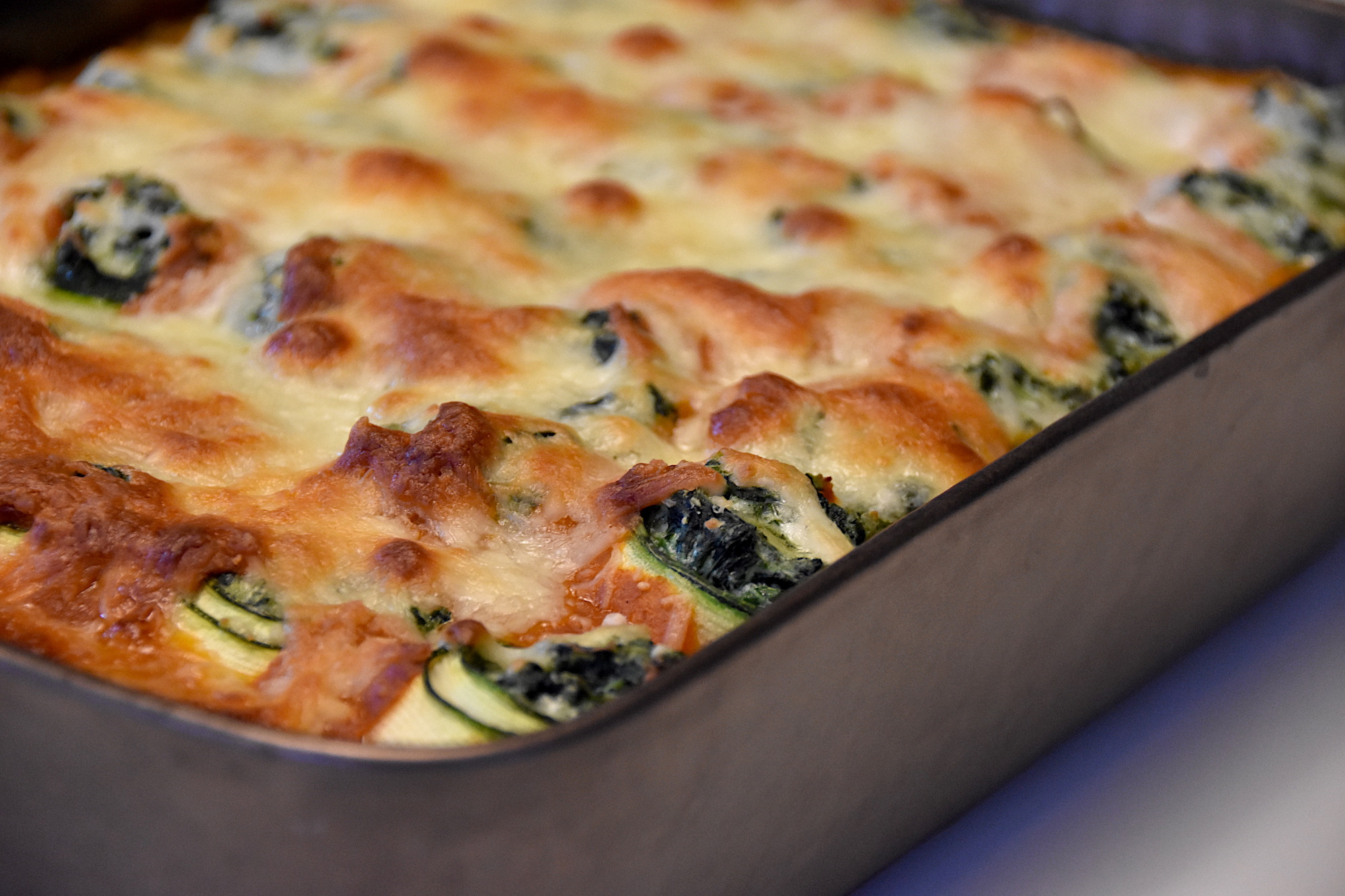 Courgetterolletjes met ricotta en spinazie