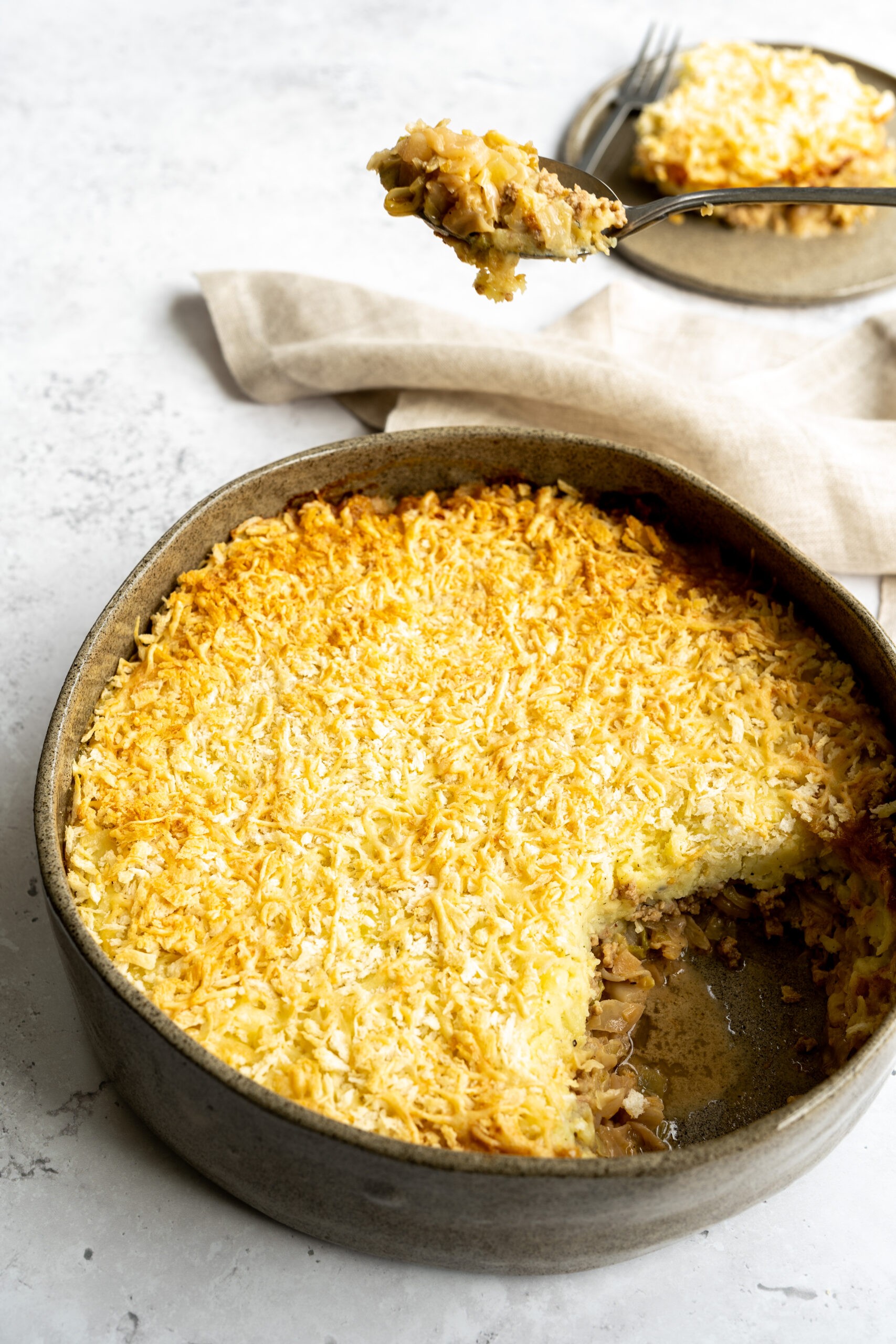 Ovenschotel met spitskool, gehakt en puree