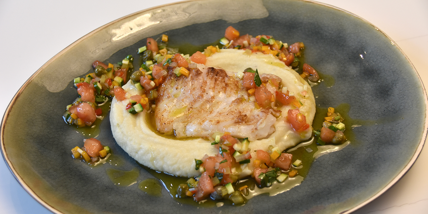 Knolselder met schelvis en een lauwe vinaigrette